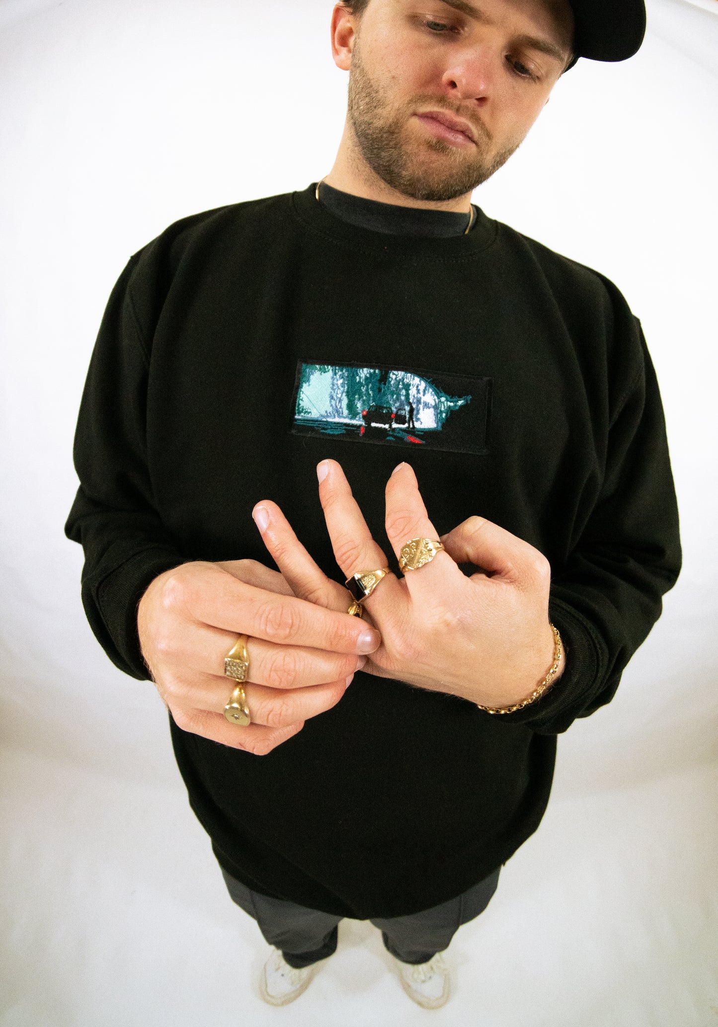 A/W23 Embroidered 'Under The Bridge In The Rain' Crewneck {black}